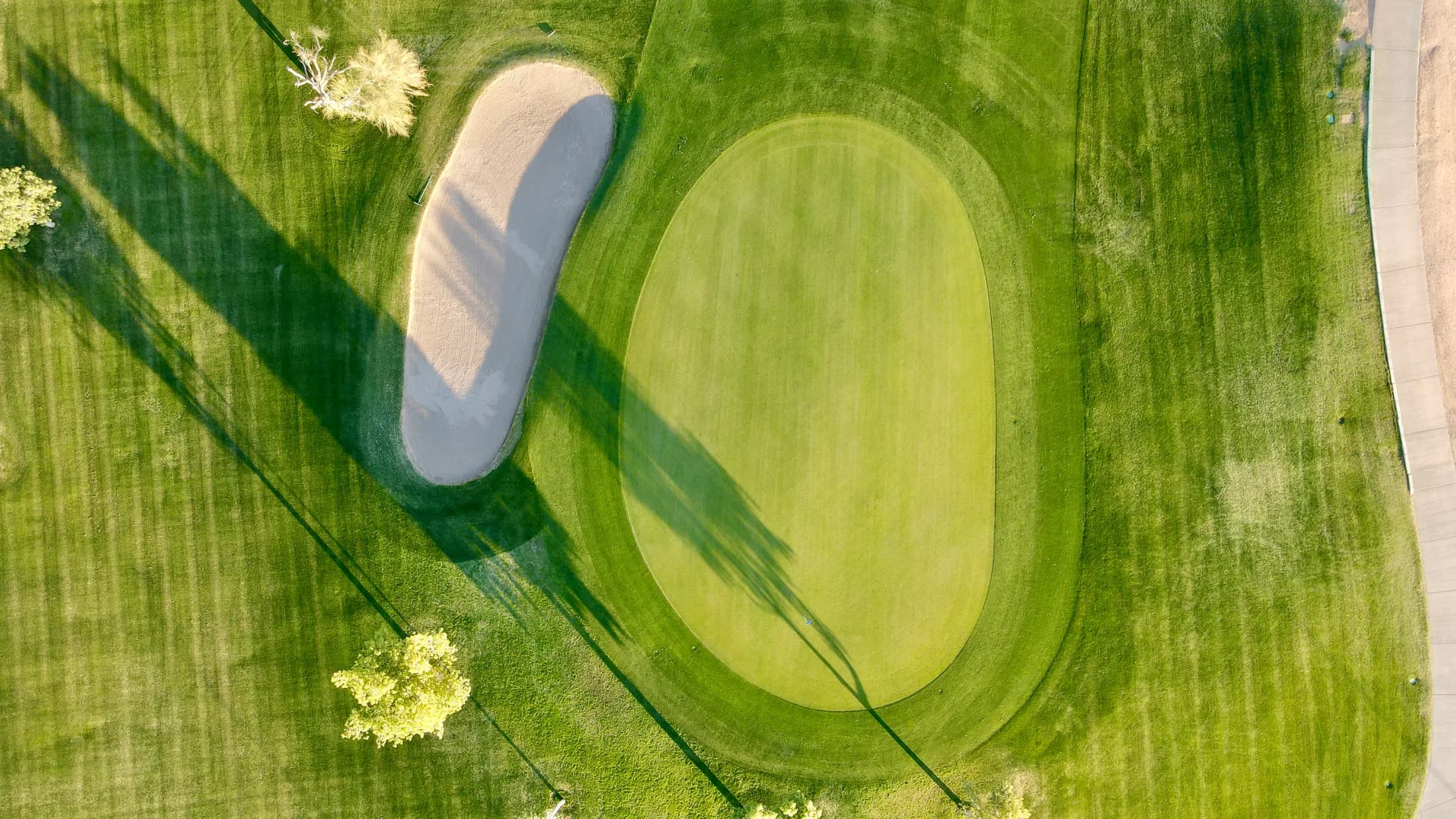 A green and bunker at Sunland Springs seen from above